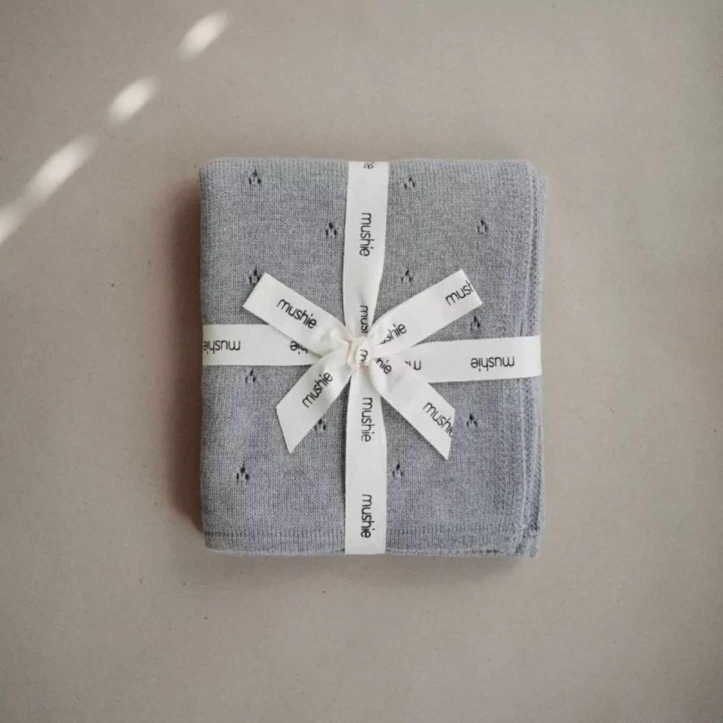 Couverture tricotée - Mushie